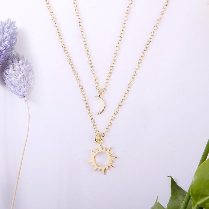 His Her Best Friend Matching Layered Necklace Female Male Creative Star Sun Necklaces  Product material: Pendant material: Alloy Material: Alloy  Details:  Product name: Double layered necklace female creative star sun necklace Product material: alloy Product size: 37.5cm Product weight: 6g Product color: gold Product packaging: opp packaging    Packing list Necklace x1