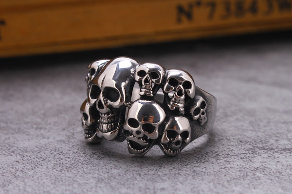 This Titanium Steel Skulls ring is a great choice for anyone looking for a stylish, durable accessory. It is crafted from titanium steel for superior strength and enhanced resistance against water and rust. The striking design features multiple gleaming skulls for a unique, eye-catching look.