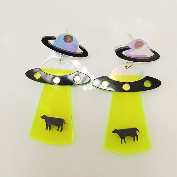 These unique earrings feature a unique 2D Alien Spaceship design crafted from acrylic material. With detailed features and a durable construction, these earrings are sure to last for years. They are lightweight and comfortable to wear, making them a perfect choice for long days and nights. Perfect for the intergalactic traveler in your life.