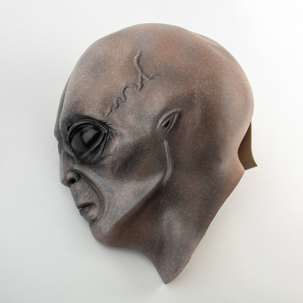 This unique Alien Mask Latex Headgear is sure to make a statement at your next Halloween celebration! Expertly crafted from silicone for maximum durability, it features intricate detailing for a realistic look and feel. Enjoy superior comfort and style, knowing you have the most eye-catching costume in the room.