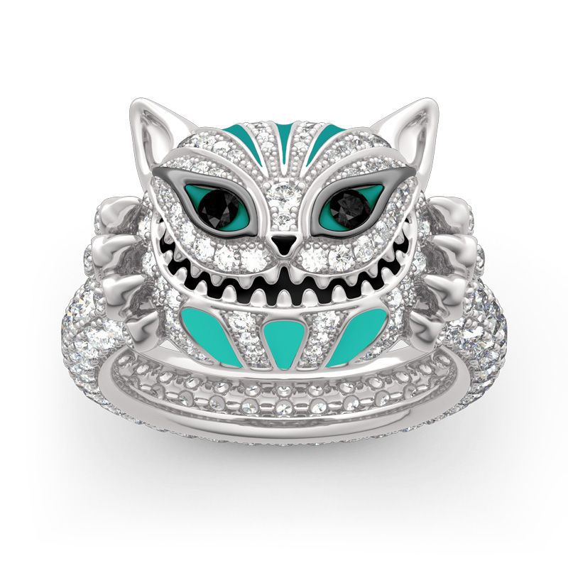 This stylish and timeless ring features an intricate Cheshire Cat design set into a sterling silver band. Crafted with attention to detail, this piece is an expertly crafted and unique accessory to add to any outfit. Its thoughtful design and careful craftsmanship provide a look that is both elegant and eye-catching.