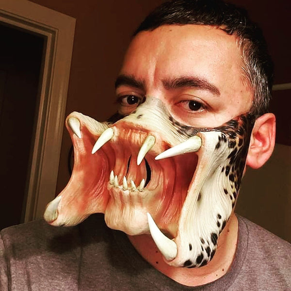 This Alien Vs Predator Latex Mask is made from durable latex and features realistic detailing and design. The adjustable straps provide a secure and comfortable fit while the full-face design allows you to transform into the Predator or Alien of your choice. Get ready for a Halloween costume that will have everyone in awe!